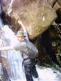 A rushing waterfall, a perfect place for a climb in Thailand.