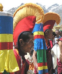Monks don their ceremonial headgear to greet the Dalai Lama at Kungri.