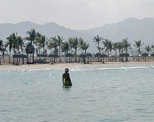 The Gulf Beach at Muscat with the mountains of Hajar al Gharbi in the background