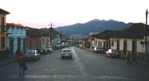 Dawn comes usover the mountains in San Cristobal de las Casas - photo by Richard Arghiris