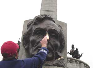 Visitors at the Abraham Lincoln Museum in Springfield rub Abe's nose for luck. Photo by Dominic Degrazier