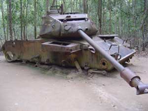 An American tank rusts away in the jungles of Vietnam.