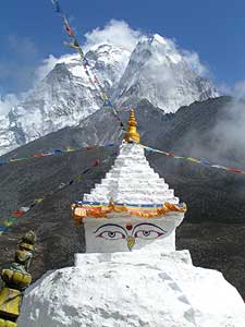 Hiking to the Base of Mt. Everest 2 Mount Everest is seen behind a shrine in Dingboche - photos by David Rich