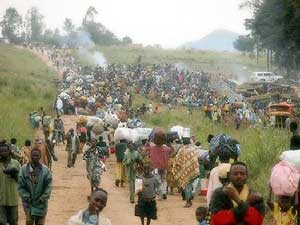Gorillas and Guerillas in the Democratic Republic of Congo 4 Villagers fleeing from rebel attacks (note the UN vehicle in the background)