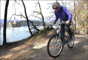  The author biking the six-mile path around Lake Bled. Photo by Reid Bramblett, reidsguides.co