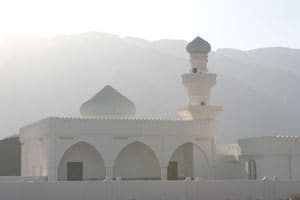 Mosque against the Hajar Mountains