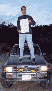 Charles Ragsdale atop his faithful Toyota 4-runner, sold at a profit in Paraguay after his 25,000 mile odyssey.