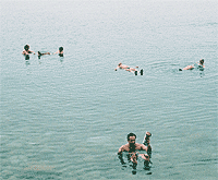 Floating the Dead Sea, One of Jordan's Wonders 3 Floating in the Dead Sea near the Jordan River's entranc