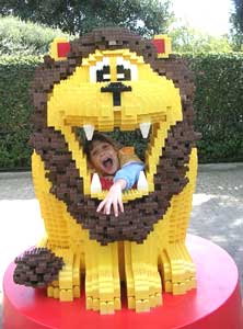 Isabella is swallowed by a Lego lion.