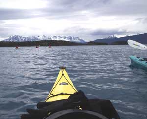 Sea kayaking toward the mountains