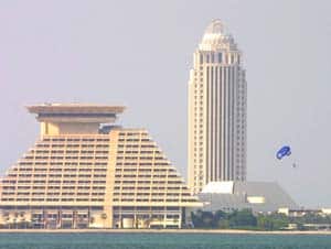 Qatar: Capturing the Magic of Arabia 5 A paraglider sails past the Sheraton