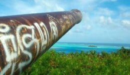 A rusty American artillery gun on Bora Bora.