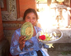 Indonesia: Bali After the Bombings 6 A Woman Arranges Offerings to the Gods