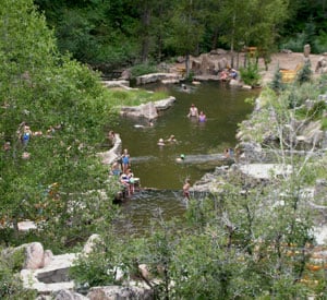People enjoy the hot springs at Strawberry Springs in Grand County Colorado.