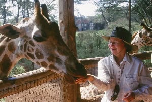 Travia: The Ultimate Book of Travel Trivia 2 Feeding a giraffe in in Kenya.