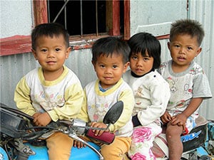 Children on a motorcycle in Bontoc