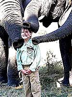 East African Safaris: A Unique Family Experience 4 A visitor is greeted by elephants.
