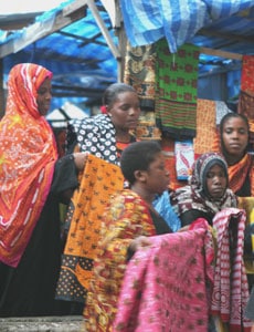 Zanzibar: A Magical Blend of Arabia and Africa 6 Selling Kangas in Stone Town - photos by Ian Lemmin-Woofrey