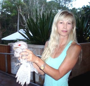A Byron Bay game warden with an injured bird