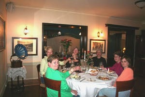 At dinner, the small groups often form strong bonds on trips