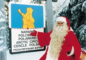 Santa points out the Arctic Circle