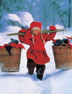 A Finnish girl with baskets of mittens
