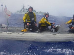 Rowing Around the World: One Woman's Odyssey 7 Crewmen from HMS Southampton deliver a valentine to Roz in the middle of the Atlantic Ocean.