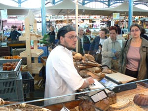 France: Burgundy Lives Up to Its Reputation 10 This bread baker sells out everything he brings to Dijon's indoor market each day.