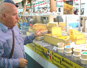 France: Burgundy Lives Up to Its Reputation 9 Alex Miles at his favorite cheese stall in Dijon's Market.