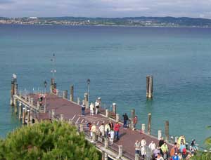 The Magical Abundance of Italy's Brescia Province 8 Passengers waiting for a boat on the dock on Lake Garda.