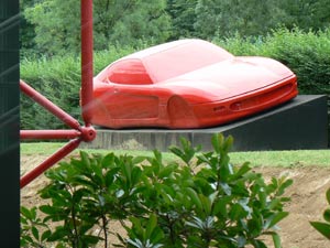 Model outside the Ferrari Gallery in Maranello, Italy