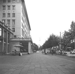 Taken on Karl-Marx-Allee near Café Sybille. The Karl Marx Buchhandlung store is on the left, and was shown the closing scenes of the film “The Lives of Others.”