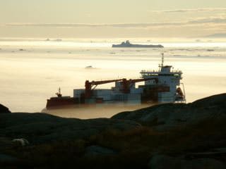 Greenland: Island of Melting Traditions 8 The icy mists can play tricks on the eyes.