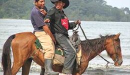 Cowboys on the beach in Panama, Central America.