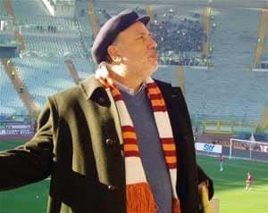 A fan of AS Roma soccer club arriving for a game in Rome.