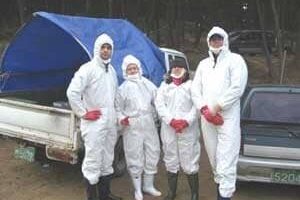 Korea: Pitching In to Clean Up An Oil Spill Getting ready.