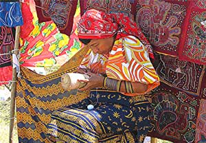 Selling crafted molas in Panama