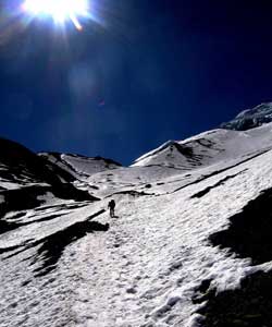 Trekking in Nepal: Change on the Horizon 2 The author climbs up Thorung-La Pass.