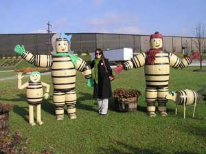 The barrel people welcome visitors to Heaven Hill Distillery.