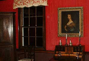 Annie's bedroom, with an image on the armoire - photo courtesy of ReggaeShow.com