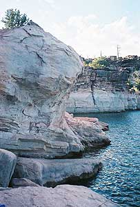 Digging Up The Past in Utah's Flaming Gorge 10 The Red, Rocky shore of Flaming Gorge in Utah