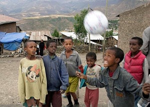 Road to Lalibela 5 A welcome gift - Kids play with a new soccer ball in Ethiopia.