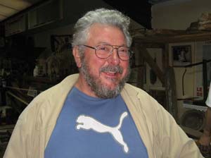 M. Boizard happily explaining the intricate displays in his bread museum in Fismes, France