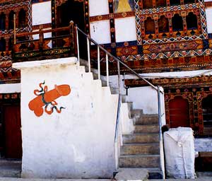 Bhutan: An Unbelievable Visit to The Tiger's Nest 3 Flying phalluses are often painted on Bhutanese houses to honor 'The Divine Madman' Drukpa Kinley.