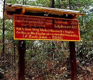 Bhutan: An Unbelievable Visit to The Tiger's Nest 5 A sign admonishes pilgrims to 'Walk to Gugu's Glory'.