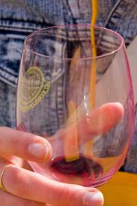 As wine is pouring in hectoliters, it gets more and more difficult to keep your glass straight. (One hectoliter equals 26 US gallons.)