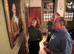 Visitors admire one of the many works of colonial art at Historic Deerfield