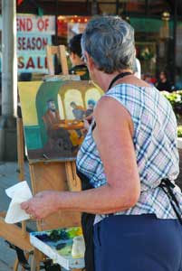 Grand Junction, Colorado: Western Charm and Mountain Splendor 3 Veggies and fruit aren't the only ones making an appearance at the annual Farmers' Market. Local and regional artists make their way to the city during the festival as well. Visitors can watch them at work and buy their original prints on site.
