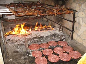 Grilling piglets in Sardinia.