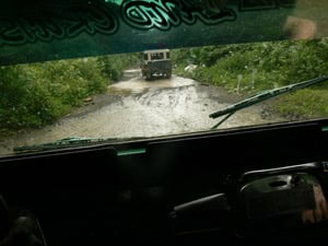 The road to El Valle, on Colombia's Pacific coast: 14 kilometers of ruts, potholes and rivers of mud. Photos by Max Hartshorne